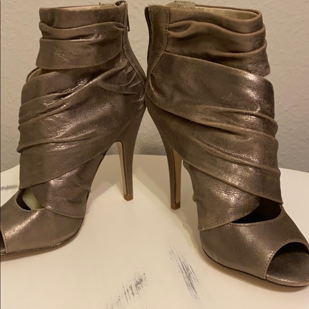 Beautiful distressed peep toe booty